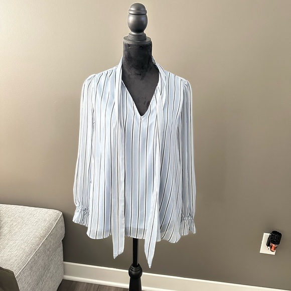 LC Lauren Conrad White and Black Striped Blouse
#3 - Picture 2 of 3